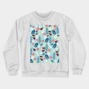 Spring meadow in bloom with ladybirds on blue background Crewneck Sweatshirt